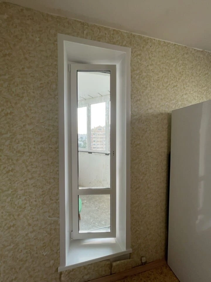 Балконный блок с двухкамерным стеклопакетом после установки